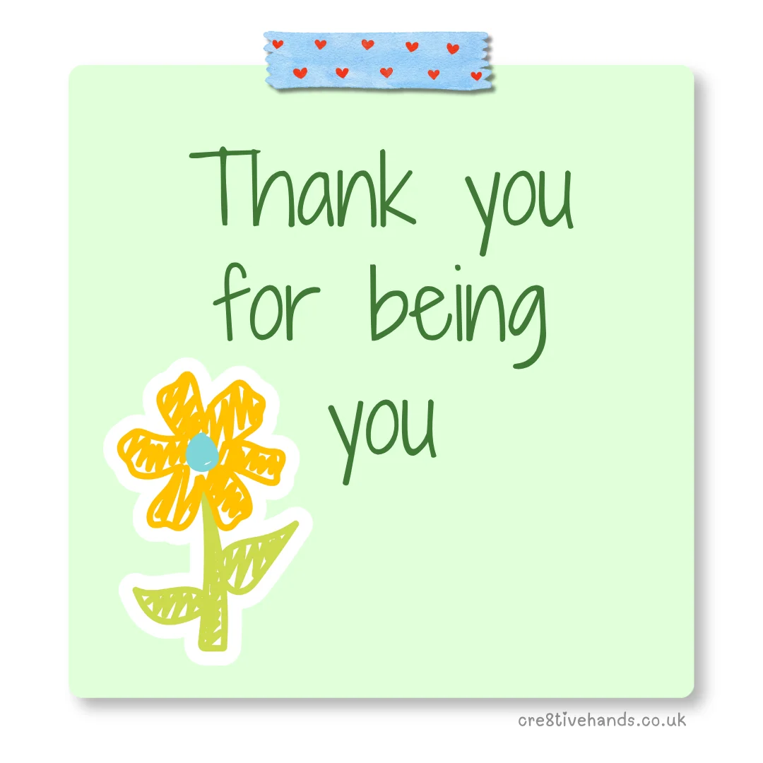 Pastel green sticky note with the message “Thank you for being you” with blue heart tape and a yellow flower doodle.