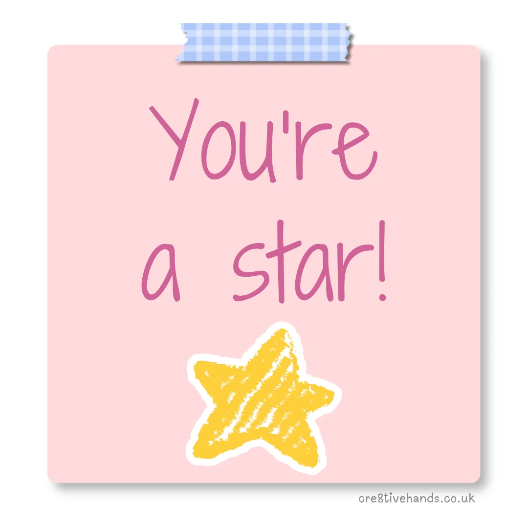 Pastel pink sticky note with the message “You’re a star!” with blue gingham tape and a yellow star doodle.