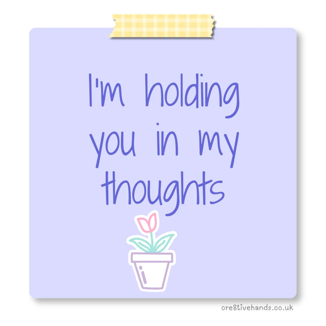 Pastel purple sticky note with the message “I’m holding you in my thoughts” with yellow gingham tape and a small flower pot doodle.