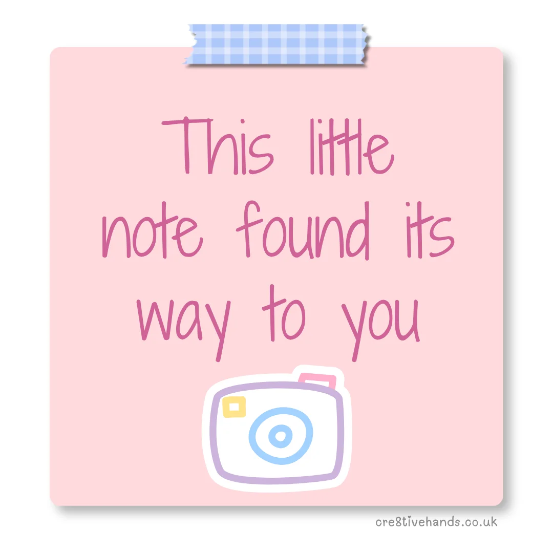 Pastel pink sticky note with the message “This little note found its way to you” with blue gingham tape and a camera doodle.