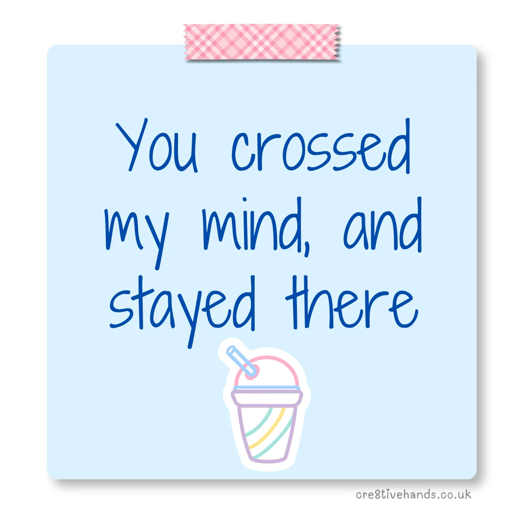 Pastel blue sticky note with the message “You crossed my mind, and stayed there” with pink gingham tape and a drink cup doodle.